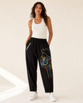 Pantalón negro unisex customizado con máscara africana, arte urbano Mi Negra Bella